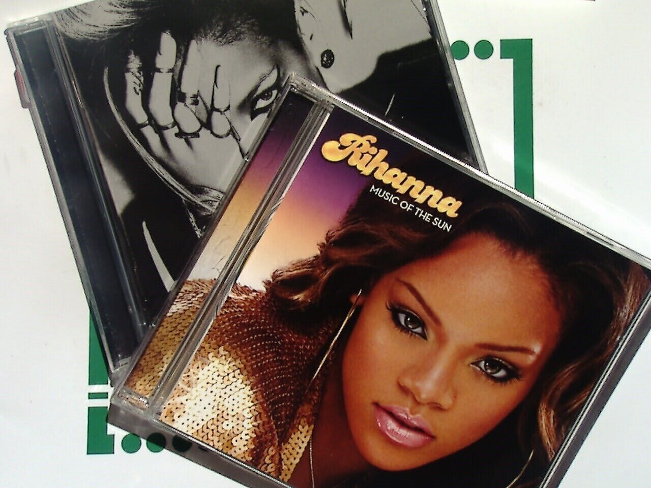 2 x Rihanna CDs - Music Of the Sun / Rated R Mint