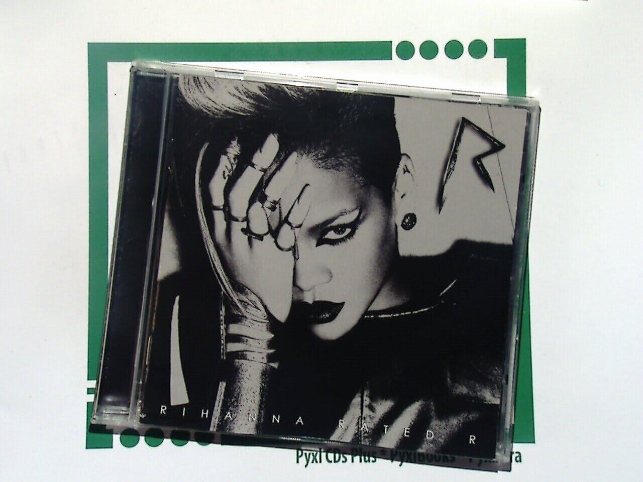 2 x Rihanna CDs - Music Of the Sun / Rated R Mint