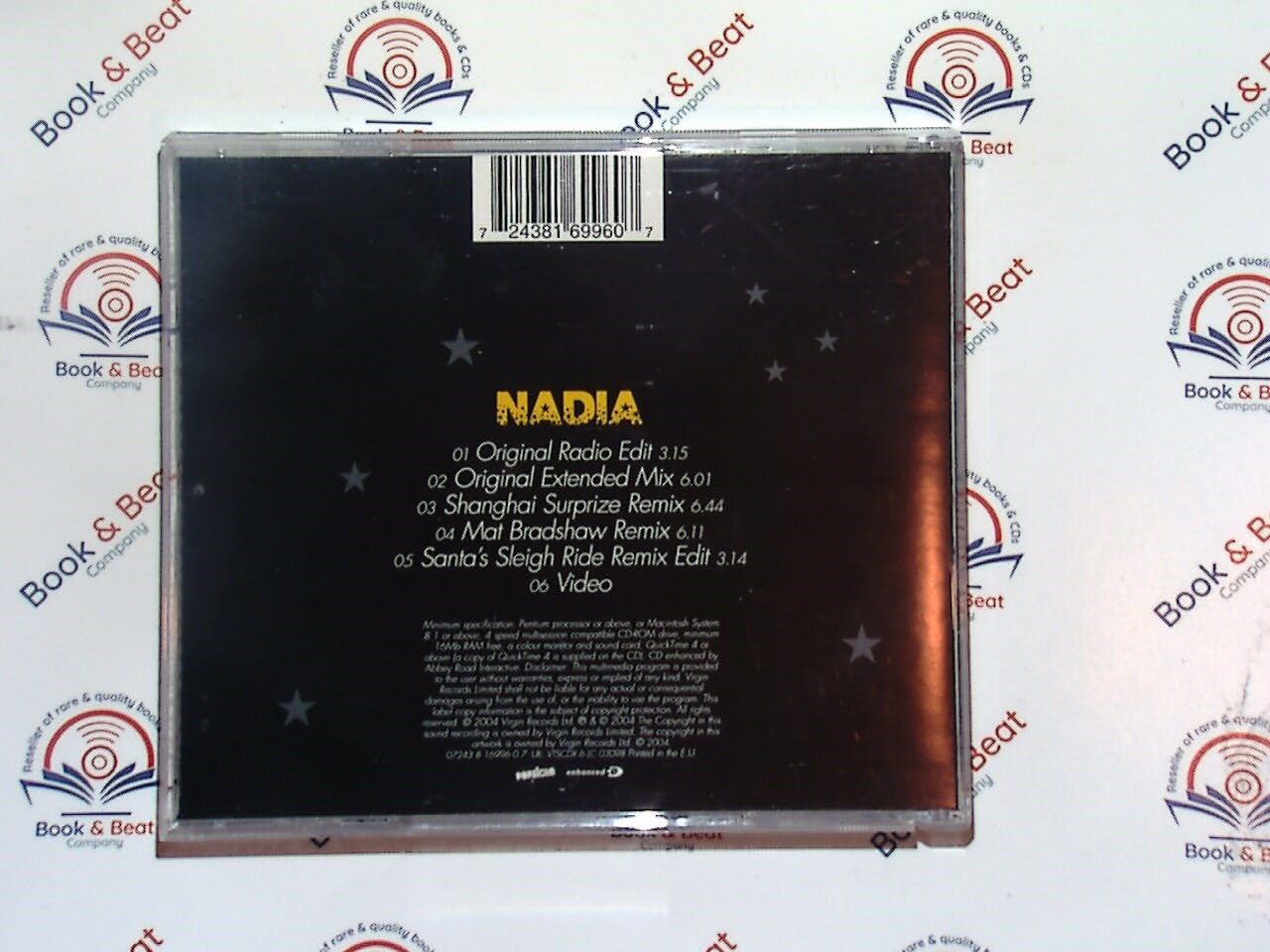 bookandbeat.com, Nadia, Little Bit of Action, CD single, pop music, upbeat track, female artist, catchy tune, dance-pop, 2000s pop, radio hit, energetic vocals, music collectible, limited edition, chart contender, memorable chorus, vibrant sound, party anthem, fan favorite, easy listening, feel-good music.