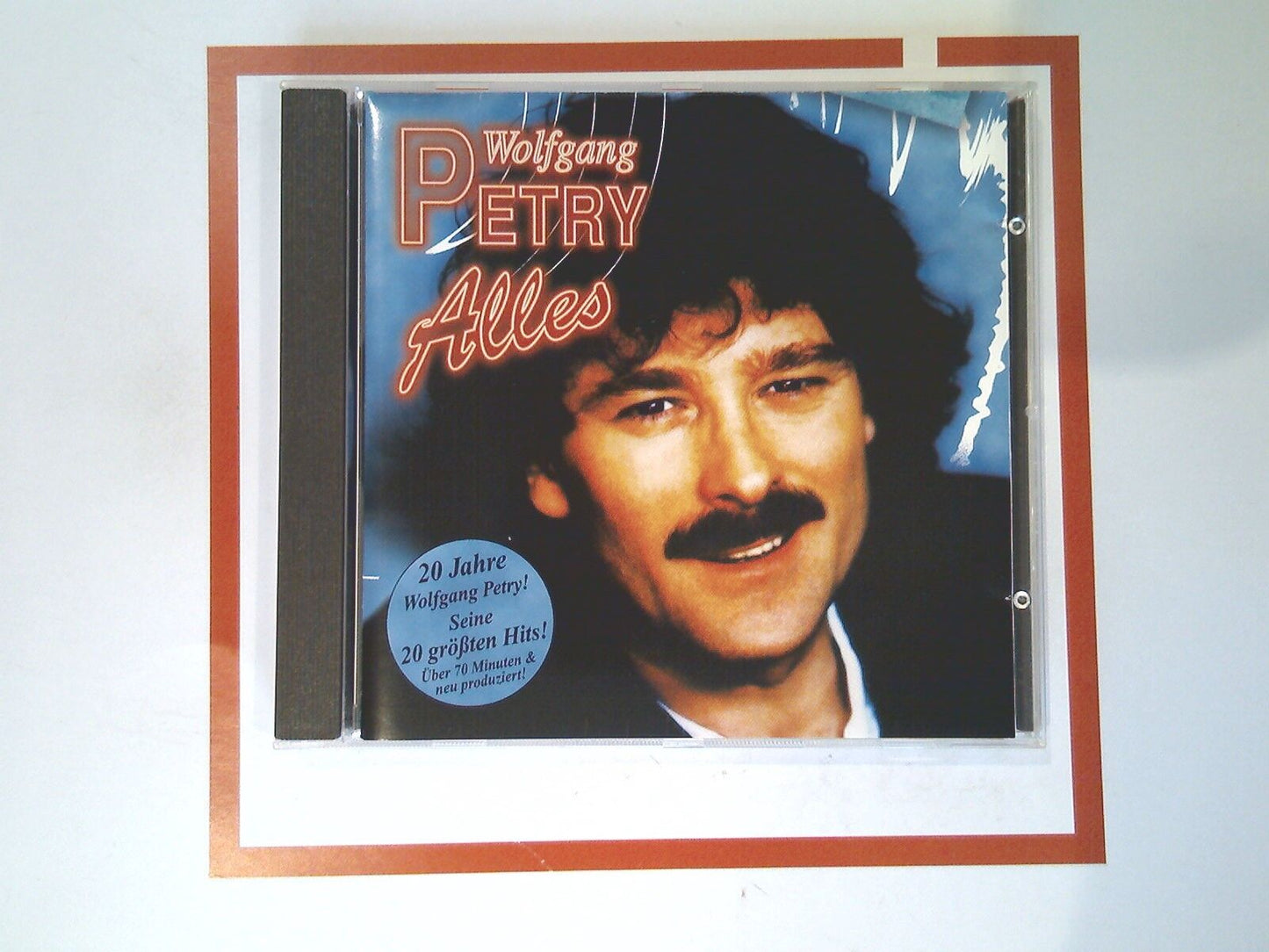 Wolfgang Petry, Alles album, Schlager music, German pop, bookandbeat.com, party hits, 90s German music, feel-good songs, Schlager star, chart-topping hits, Europop, catchy tunes, sing-along music, German culture, Petry classics, iconic Schlager, upbeat pop, timeless hits, German music legend, Schlager favorites, festive music,