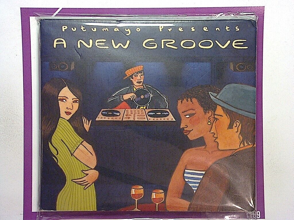 Putmayo Presents	A New Groove Promo CD VGC