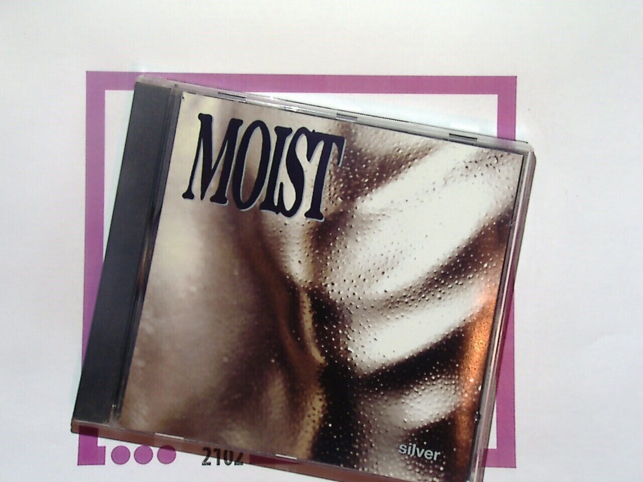 Moist	Silver CD Mint