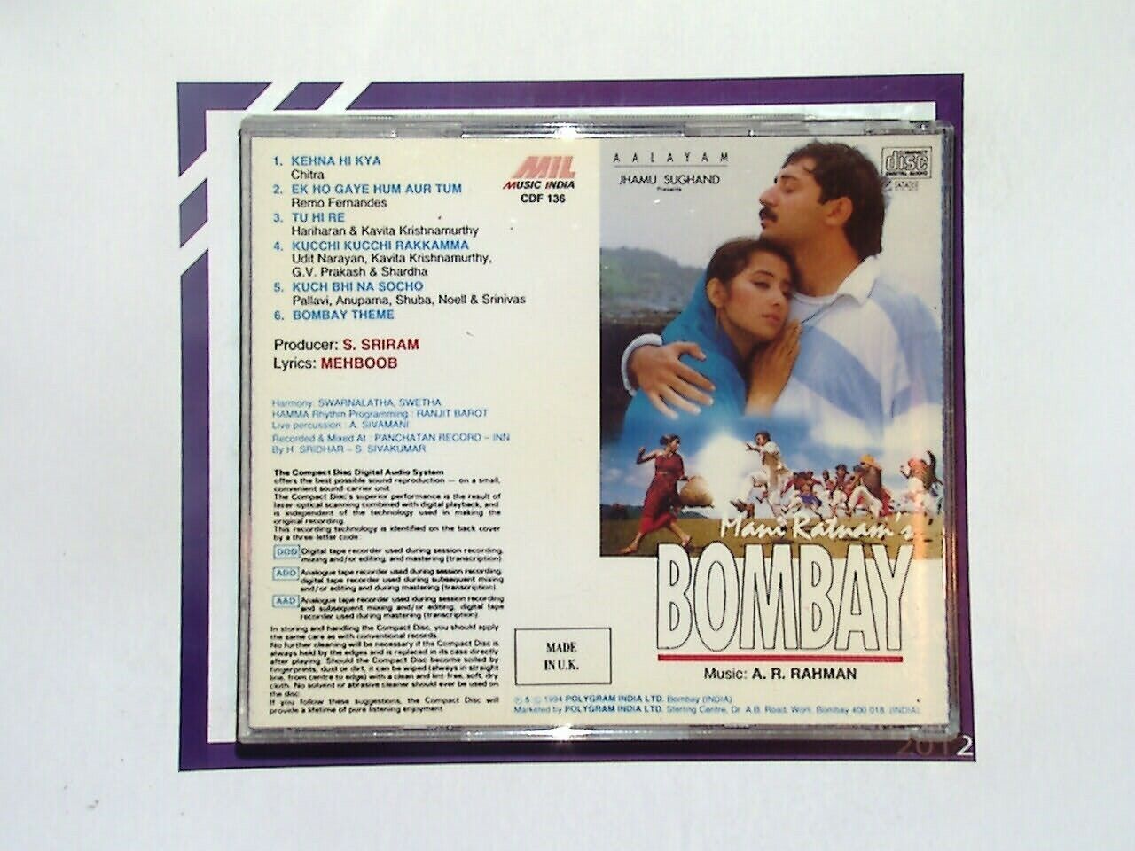 A.R. Rahman, Bombay Soundtrack, CD, Music Album, Soundtrack, Indian Music, Film Score, Bollywood, World Music, Grammy Winner, Iconic Sound, Melodic Compositions, Cultural Fusion, Classic Soundtrack, Music Collection, Movie Music, Award-Winning Artist, Music Enthusiast, Unique Sound, Emotionally Charged, Musical Journey, Contemporary Sound, Diverse Genres, Authentic Sound, Listening Experience, Soundtrack Lovers, Music Discovery, Film Music, A.R. Rahman Fans, Cinematic Experience, Album Art.