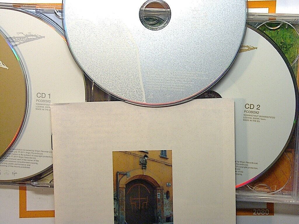  Penguin Cafe Orchestra, A History, 4 CD, Box Set, Instrumental, Classical Fusion, Avant-Garde, Ambient Music, Experimental, Collectible, Chamber Music, Minimalist, Eclectic Sound, Simon Jeffes, Contemporary Classical, Music Compilation, Orchestral, Iconic Album,Rare, Bookandbeat.com