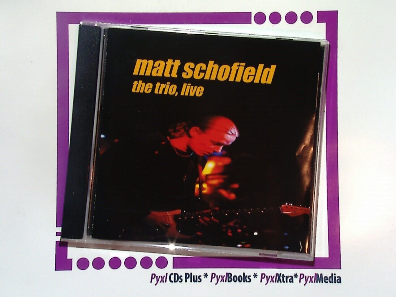 The Matt Schofield Trio, The Trio Live 2006, Bookandbeat, CD, Live Performance, Jazz, Blues, Guitar Trio, Instrumental Music, Matt Schofield, Live Album, Musical Journey, Improvisation, Concert Recording, Contemporary Jazz, Music Lovers, Live Music Experience, Trio Performance, Celebrated Guitarist, Dynamic Sound, Professional Musicians, Exciting Live Set, Unique Soundscapes, Music Enthusiasts