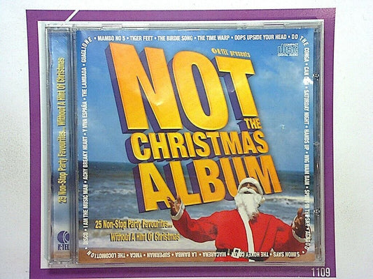 Not The Christmas Album, Various Artists, Alternative Christmas Music, Non-traditional Holiday Songs, CD Near Mint, Unique Christmas Tunes, Festive Music, Holiday Compilation, Christmas Gifts, Quirky Christmas, Fun Holiday Songs, Seasonal Album, Gift Ideas, Music Collection, Bookandbeat.com, Christmas Playlist, Rare Christmas Music, Alternative Festive Sounds, Christmas Compilation, Near Mint Condition