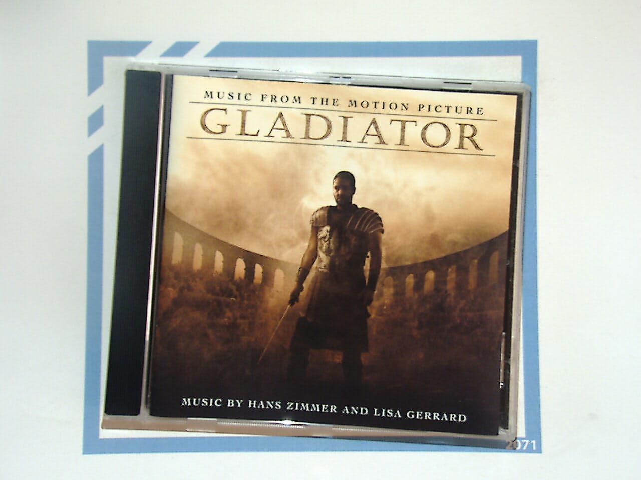 bookandbeat.com, Gladiator soundtrack, Hans Zimmer, Lisa Gerrard, film score, epic music, orchestral, cinematic sound, emotional score, iconic soundtrack, instrumental, Academy Award-winning, powerful themes, movie music, timeless score, action drama, atmospheric, orchestration, historical film, bookandbeat.com music.