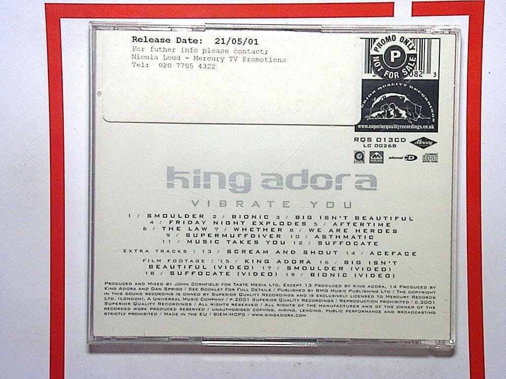 King Adora, Vibrate You, Special Edition, Promo, CD, Glam rock, British band, 2000s music, Bookandbeat.com, Alternative rock, Punk rock, Energetic, Guitar-driven, Underground rock, Edgy, Raw sound, Rock fans, Catchy tunes, Iconic album, Rock revival, Contemporary rock,