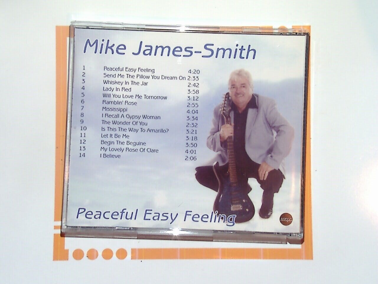 bookandbeat.com, CD, Mike James-Smith, Peaceful Easy Feeling, easy listening, relaxing music, smooth melodies, mellow tunes, peaceful ambiance, calming soundscapes, acoustic arrangements, soulful performance, reflective music, uplifting tracks, gentle rhythms, soothing vocals, chill-out album, serene vibes, timeless classics, heartfelt lyrics, music for relaxation, feel-good songs.