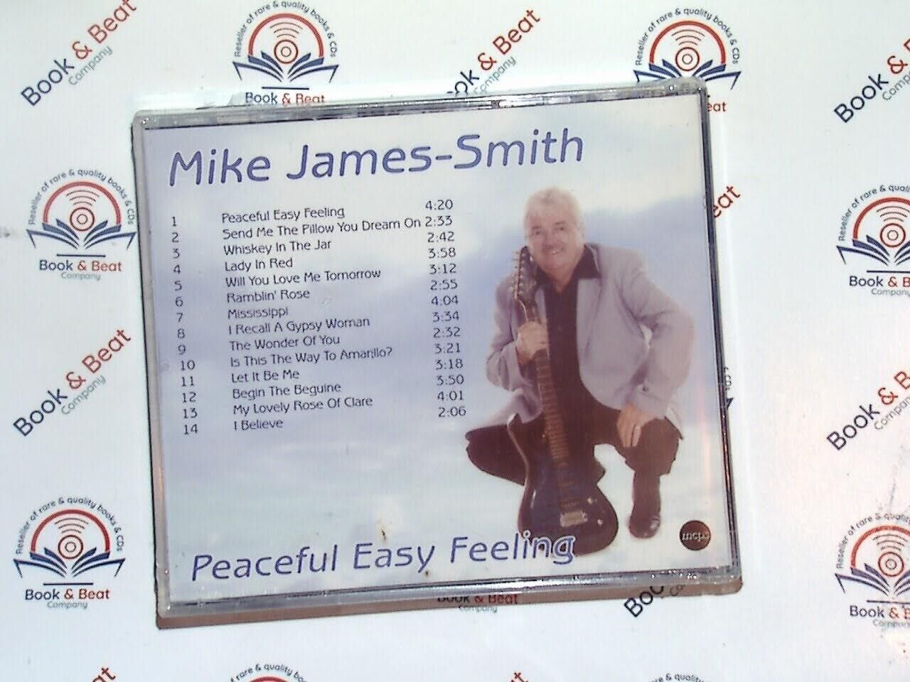 Mike James-Smith, Peaceful Easy Feeling, relaxing music, instrumental music, easy listening, peaceful melodies, calming tunes, acoustic guitar, soothing sounds, ambient music, tranquil atmosphere, music for relaxation, stress-relief music, soft rock instrumental, peaceful ambiance, bookandbeat.com, new CDs, used CDs, new books, used books, online music store, online bookstore, rare CDs, rare books, affordable books, affordable CDs, book lovers, music enthusiasts, collectible CDs, vintage books,DVD,
