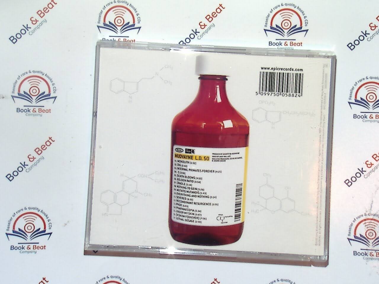 bookandbeat.com, Mudvayne, L.D. 50, metal, progressive metal, nu-metal, alternative metal, heavy music, iconic albums, 2000s rock, concept album, aggressive vocals, complex rhythms, Chad Gray, Ryan Martinie, Matt McDonough, Greg Tribbett, experimental metal, groundbreaking metal, metal classics, must-have albums, dynamic sound.