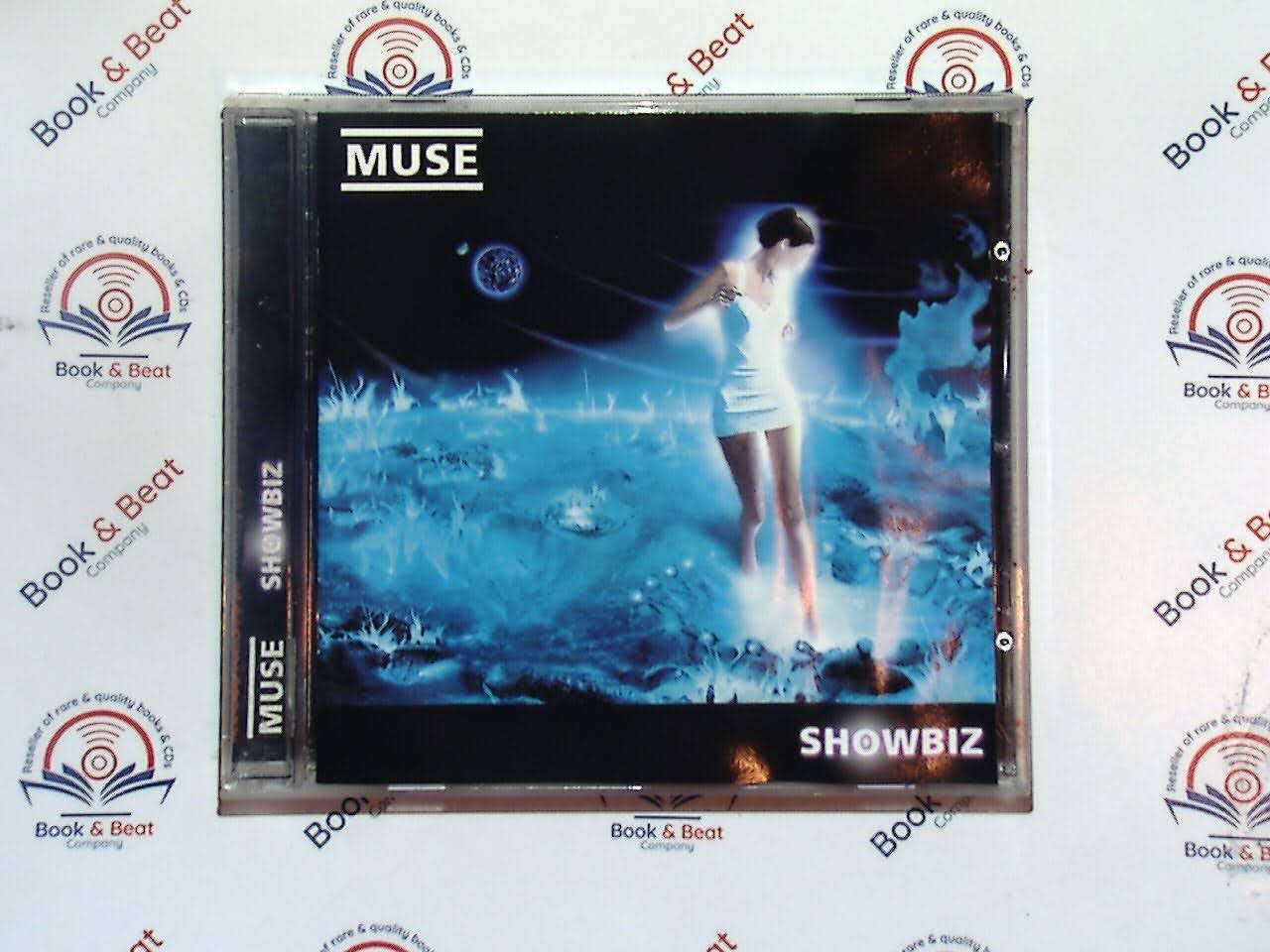 Muse, Alternative Rock,Showbiz, Rock Anthems, British Band, Matt Bellamy, Progressive Rock, Hard Rock, Collector’s Item, VGC CD, Rare Tracks, Iconic Performances, Bookandbeat.com, Must-Have Album, new CDs, used CDs, new books, used books, online music store, online bookstore, rare CDs, rare books, affordable books, affordable CDs, book lovers, music enthusiasts, collectible CDs, vintage books,DVD,