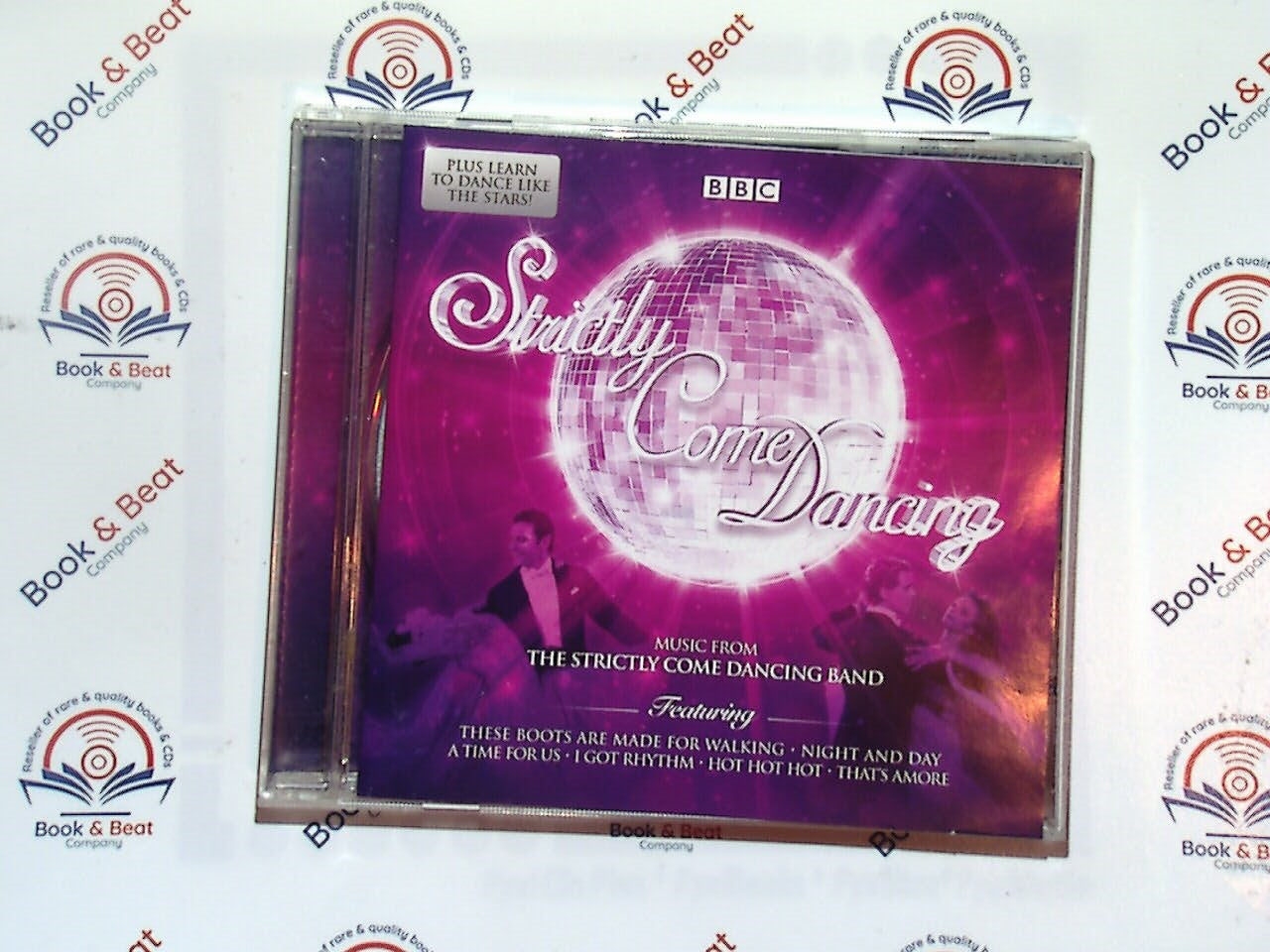 Dave Arch, Strictly Come Dancing, The Strictly Come Dancing Band, Dance music, CD, Ballroom, Latin dance, TV show soundtrack, Dance competition, Swing, Tango, Samba, Pop covers, Jazz, Live performances, Iconic dances, Bookandbeat.com, Orchestral arrangements, Party music, Dancefloor hits, Dancing enthusiasts,