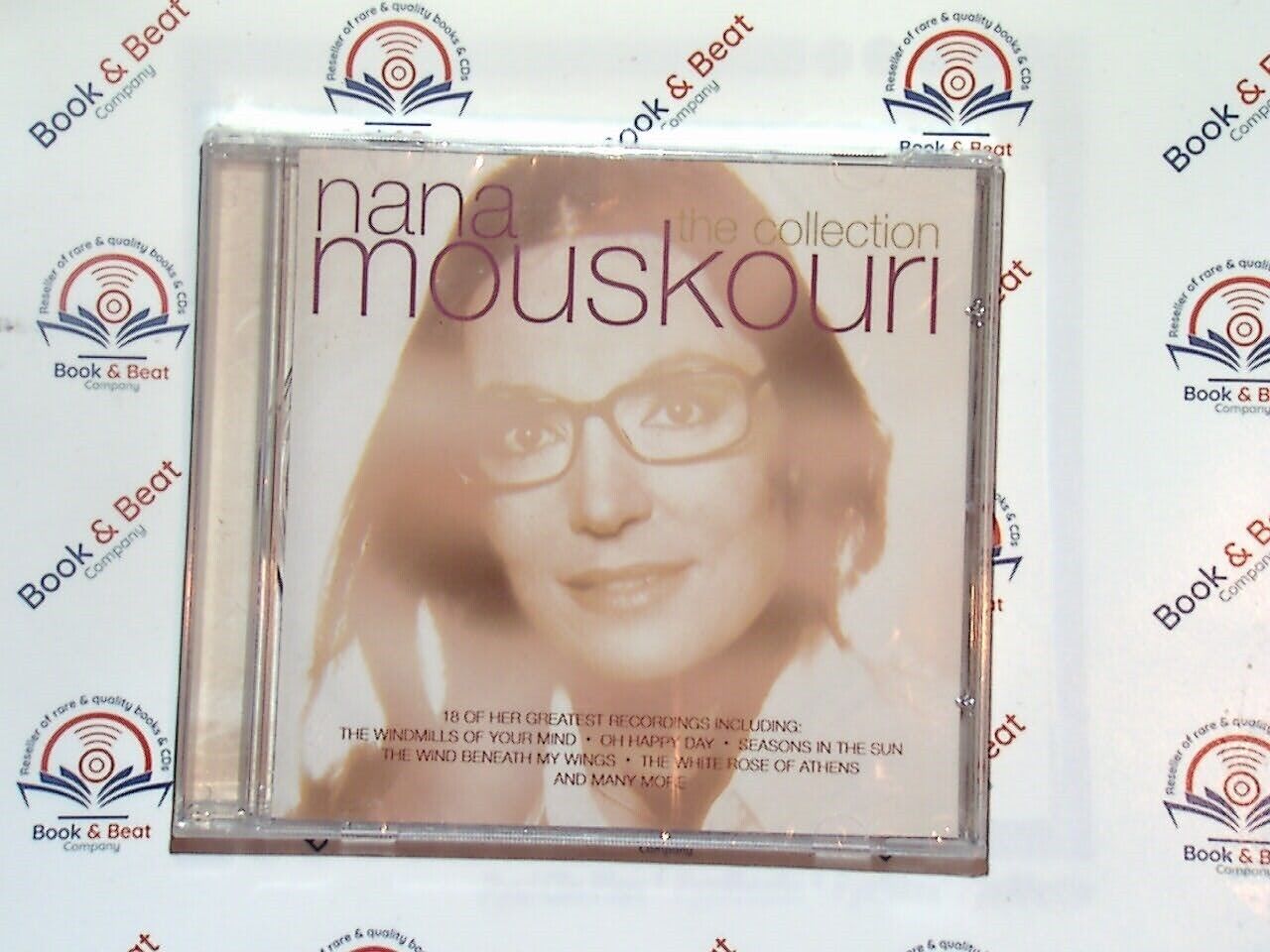 bookandbeat.com, Nana Mouskouri, The Collection, compilation album, timeless classics, Greek vocalist, multi-language songs, diverse musical styles, folk and pop music, beloved hits, international success, emotional depth, iconic voice, traditional Greek elements, popular ballads, jazz and world music influences, smooth vocals, melodic arrangements, music anthology