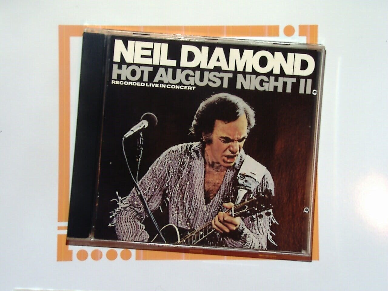 bookandbeat.com, Neil Diamond,  singer-songwriter, classic pop, Neil Diamond album, ballads, soft rock, 2000s music, iconic artist, heartfelt lyrics, legendary performer, contemporary pop.