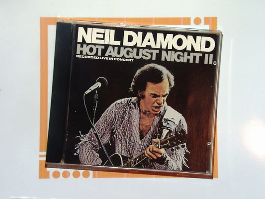 bookandbeat.com, Neil Diamond,  singer-songwriter, classic pop, Neil Diamond album, ballads, soft rock, 2000s music, iconic artist, heartfelt lyrics, legendary performer, contemporary pop.