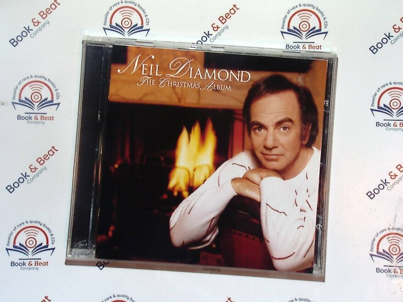 bookandbeat.com, Neil Diamond, The Christmas Album, holiday music, Christmas classics, festive songs, seasonal music, yuletide favorites, Christmas cheer, iconic vocalist, winter melodies, holiday spirit, traditional carols, Christmas joy, seasonal collection, festive atmosphere, Neil Diamond Christmas, nostalgic holiday music, Christmas celebration, family gatherings, heartwarming tracks, timeless Christmas album, holiday playlist, holiday nostalgia, classic Christmas tunes,