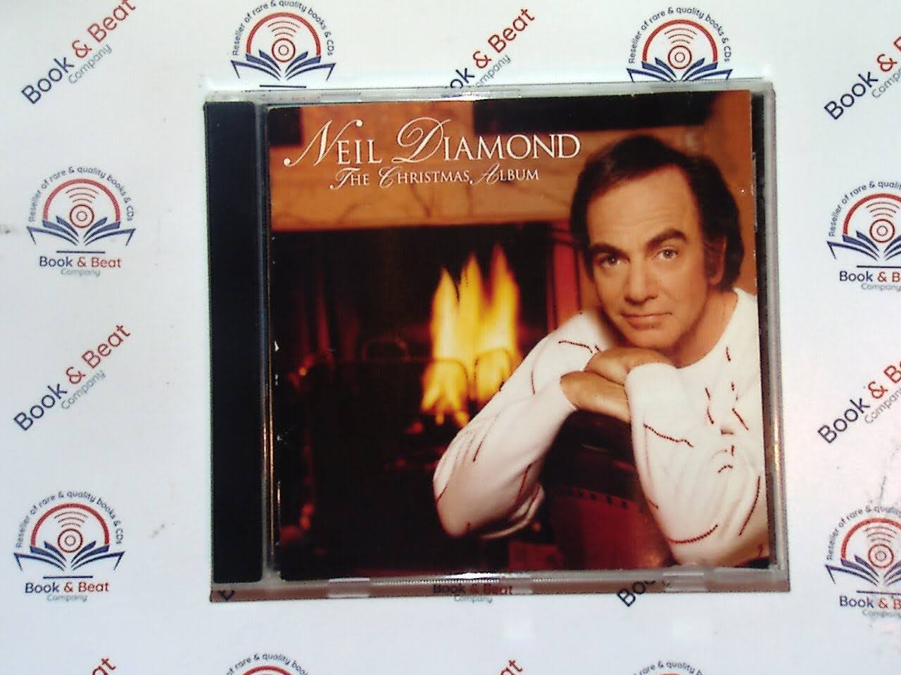 bookandbeat.com, Neil Diamond, The Christmas Album, holiday music, Christmas classics, festive songs, seasonal music, yuletide favorites, Christmas cheer, iconic vocalist, winter melodies, holiday spirit, traditional carols, Christmas joy, seasonal collection, festive atmosphere, Neil Diamond Christmas, nostalgic holiday music, Christmas celebration, family gatherings, heartwarming tracks, timeless Christmas album, holiday playlist, holiday nostalgia, classic Christmas tunes,