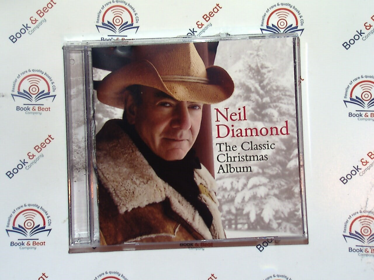 bookandbeat.com, Neil Diamond, The Christmas Album, holiday music, Christmas classics, festive songs, seasonal music, yuletide favorites, Christmas cheer, iconic vocalist, winter melodies, holiday spirit, traditional carols, Christmas joy, seasonal collection, festive atmosphere, Neil Diamond Christmas, nostalgic holiday music, Christmas celebration, family gatherings, heartwarming tracks, timeless Christmas album, holiday playlist, holiday nostalgia, classic Christmas tunes,classic