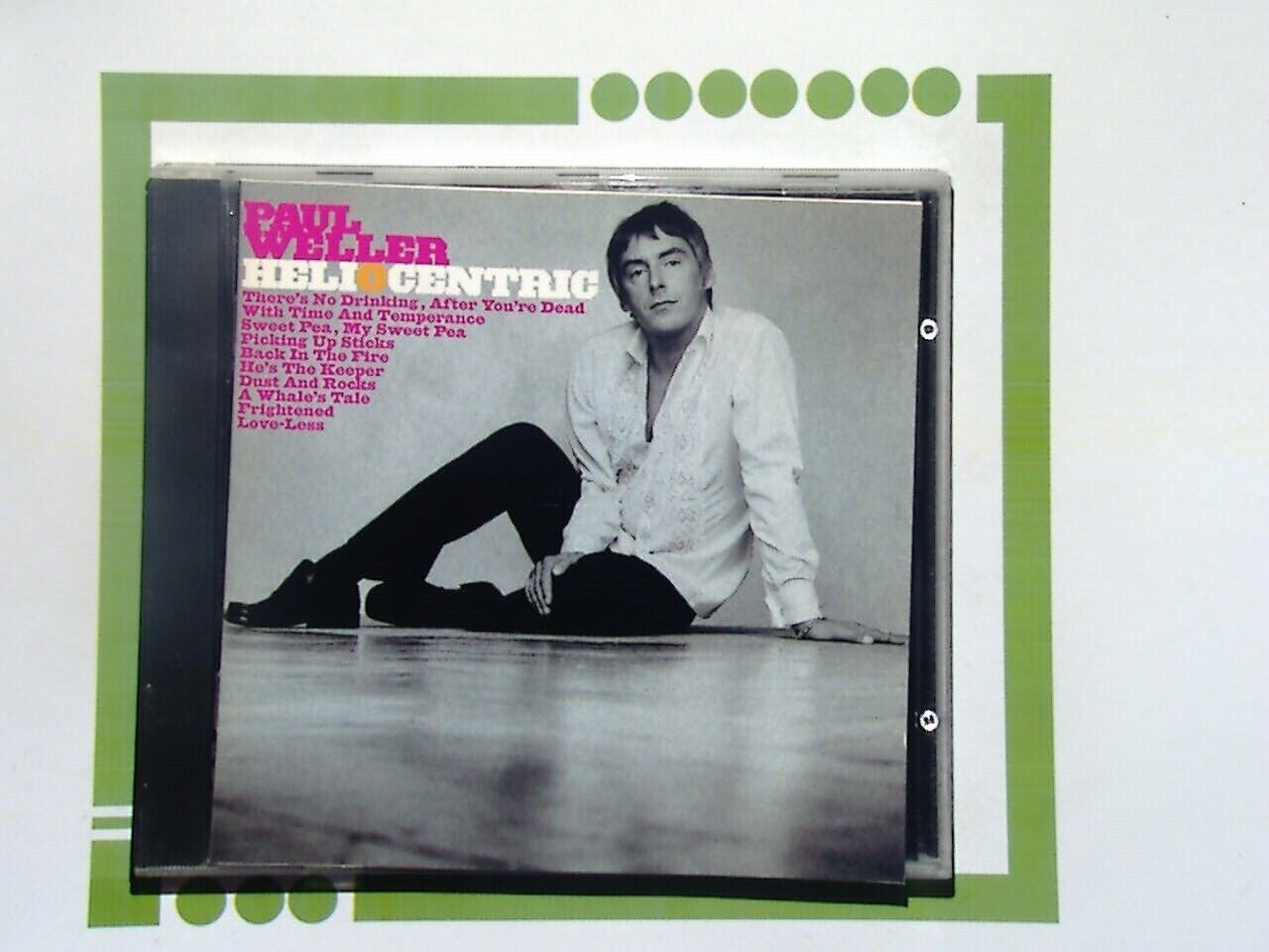 bookandbeat.com, Paul Weller, Essential Singles Collection, mod revival, The Jam, The Style Council, British rock, classic singles, greatest hits, iconic musician, songwriter, Britpop, 1980s music, 1990s music, rock collection, essential albums, timeless tracks, music anthology, indie rock, UK music legend.