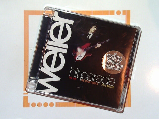 bookandbeat.com, Paul Weller, Essential Singles Collection, mod revival, The Jam, The Style Council, British rock, classic singles, greatest hits, iconic musician, songwriter, Britpop, 1980s music, 1990s music, rock collection, essential albums, timeless tracks, music anthology, indie rock, UK music legend.