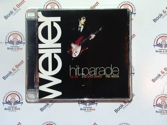 bookandbeat.com, Paul Weller, Essential Singles Collection, mod revival, The Jam, The Style Council, British rock, classic singles, greatest hits, iconic musician, songwriter, Britpop, 1980s music, 1990s music, rock collection, essential albums, timeless tracks, music anthology, indie rock, UK music legend.