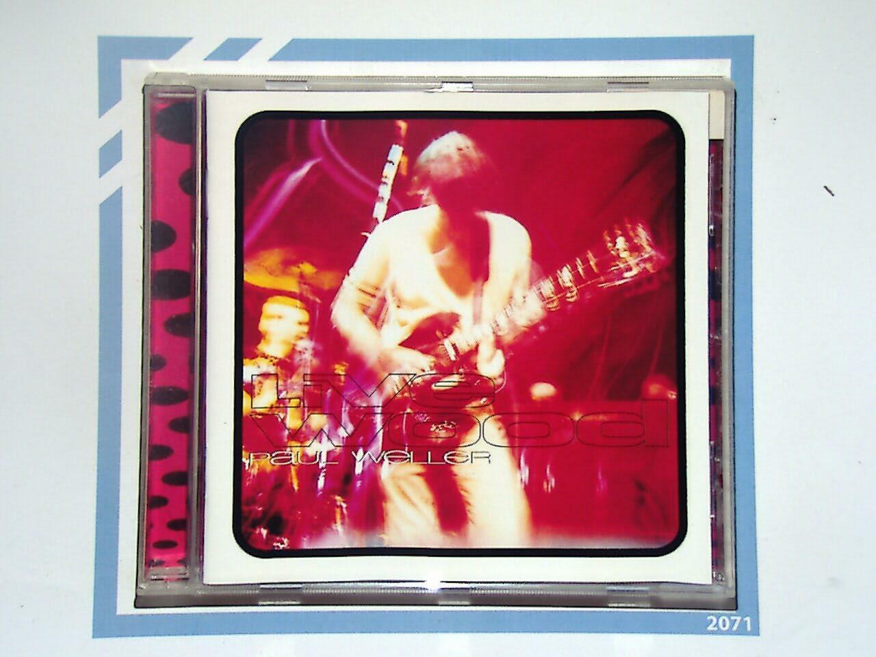 bookandbeat.com, Paul Weller, Essential Singles Collection, mod revival, The Jam, The Style Council, British rock, classic singles, greatest hits, iconic musician, songwriter, Britpop, 1980s music, 1990s music, rock collection, essential albums, timeless tracks, music anthology, indie rock, UK music legend.