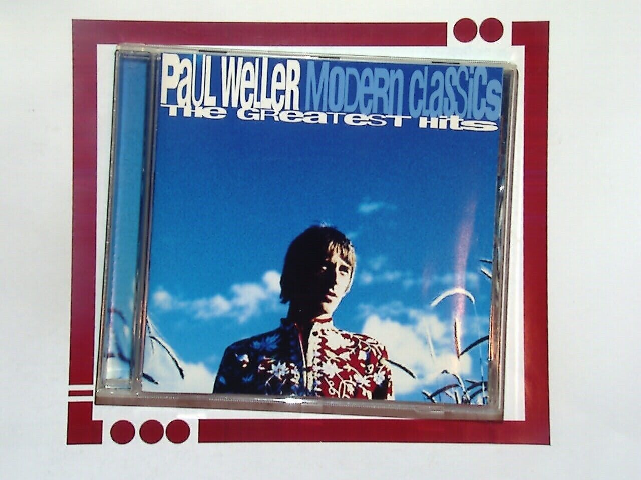 bookandbeat.com, Paul Weller, Essential Singles Collection, mod revival, The Jam, The Style Council, British rock, classic singles, greatest hits, iconic musician, songwriter, Britpop, 1980s music, 1990s music, rock collection, essential albums, timeless tracks, music anthology, indie rock, UK music legend.