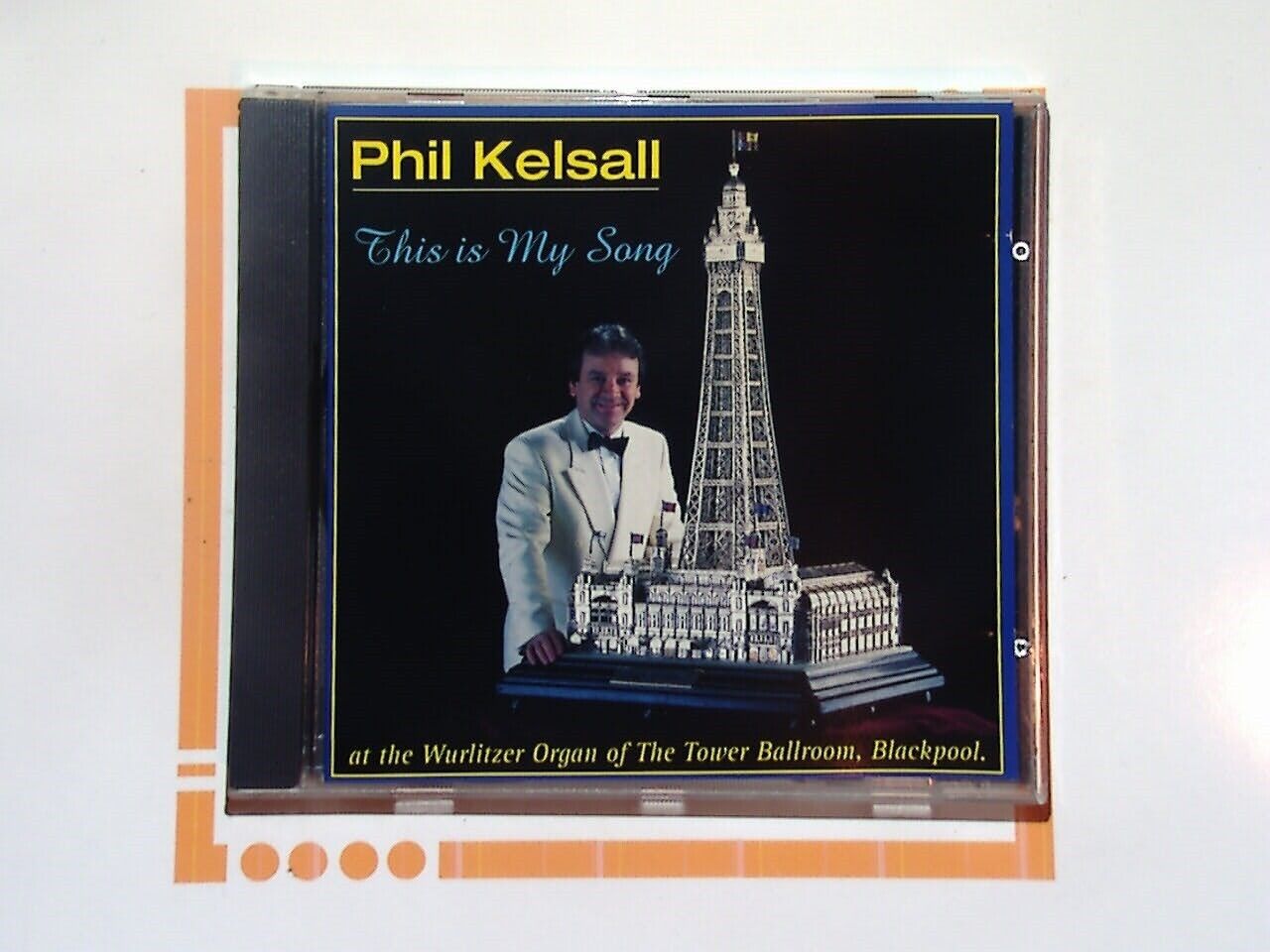 Phil Kelsall, This Is My Song, Tower Ballroom, Wurlitzer Organ, organ music, ballroom classics, instrumental music, vintage sounds, traditional melodies, iconic organist, nostalgic tunes, Blackpool Tower, easy listening, classic instrumentals, bookandbeat.com,