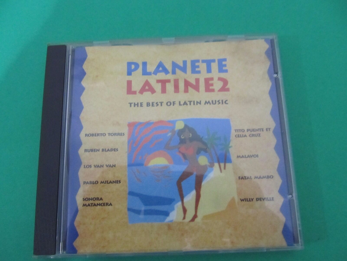 Planete Latine 2, Roberto Torres, Best of Latin Musik, CD, VGC, Latin music, Bookandbeat.com, Salsa, Merengue, World music, Dance music, Tropical rhythms, Latin hits, Caribbean sound, Cultural fusion, Rhythmic, Energetic, Melodic, Festive, Latin legends, Music enthusiasts,