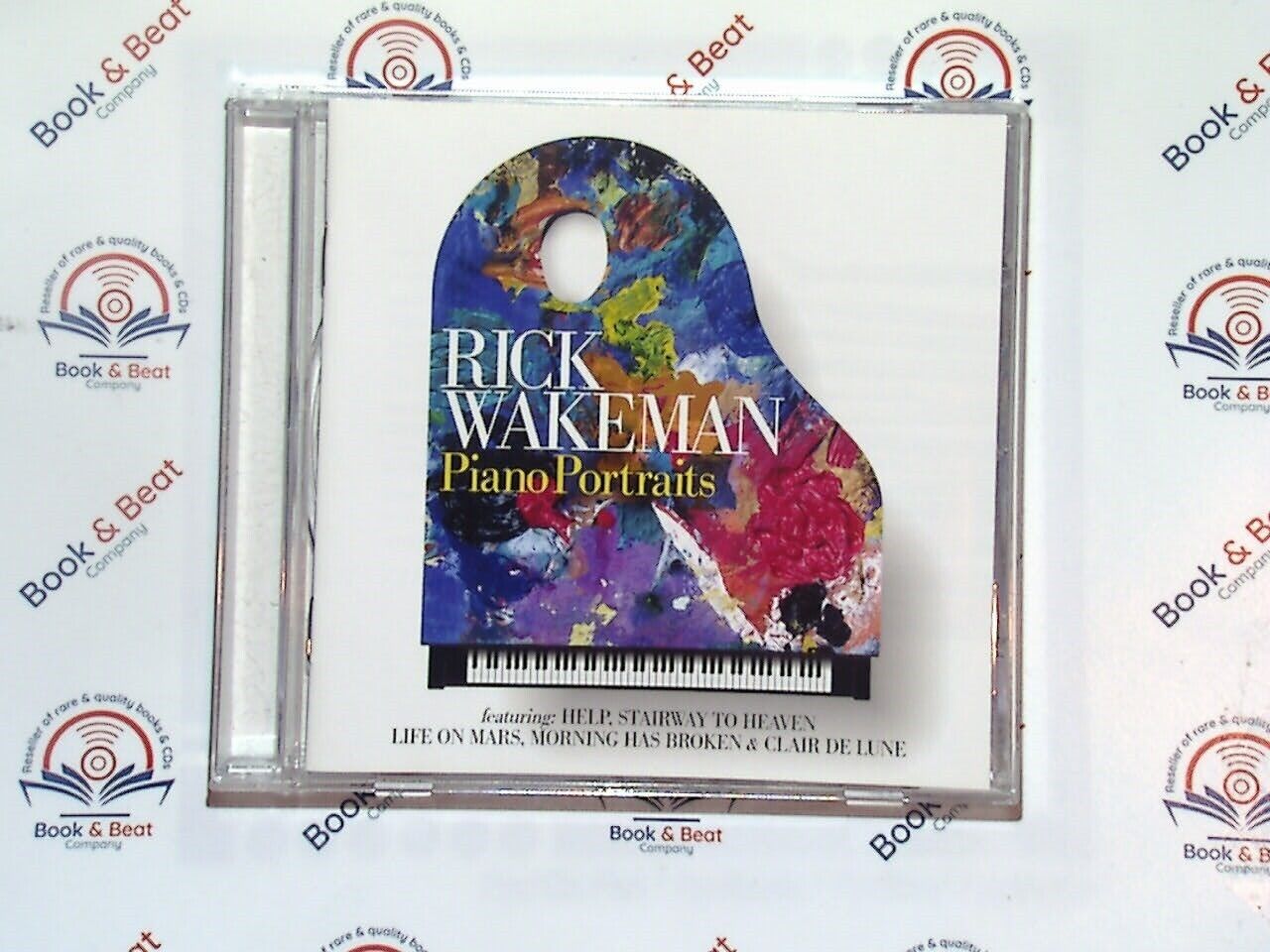 bookandbeat.com, Rick Wakeman, Piano Portraits, solo piano, classical renditions, piano music, instrumental album, iconic covers, soothing music, classical pianist, solo performance, soft piano, contemplative music, beautiful renditions, instrumental covers, piano classics, soothing soundscape, calming music, pianist virtuoso, famous melodies, relaxing music