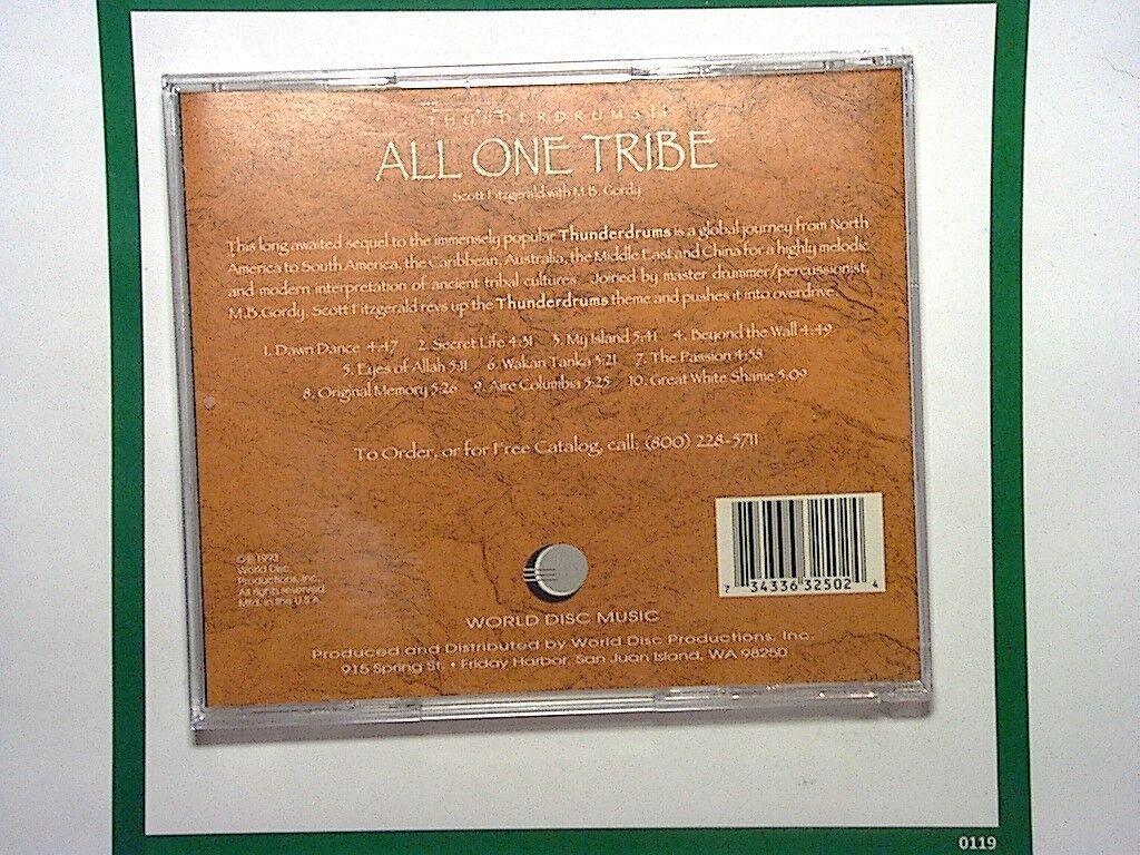 Scott Fitzgerald, M B Gordy, All One Tribe, CD, Mint condition, Bookandbeat.com, World music, Collaborative album, Fusion, Eclectic sound, Percussion, Tribal rhythms, Global beats, International music, Cultural fusion, Unique sound, Experimental, Instrumental, Contemporary world music, Musical journey, Rhythmic exploration,