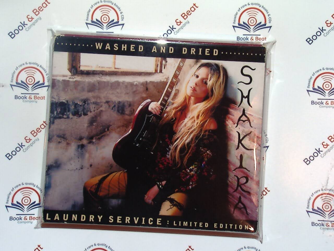 Shakira, Laundry Service, Washed & Dried, Limited Edition, Latin Pop, Pop Rock, 2000s Music, Iconic Album, Global Hits, Timeless Classics, Hips Don't Lie, Legendary Artist, VGC CD, Collector's Item, Bookandbeat.com, new CDs, used CDs, new books, used books, online music store, online bookstore, rare CDs, rare books, affordable books, affordable CDs, book lovers, music enthusiasts, collectible CDs, vintage books,DVD,