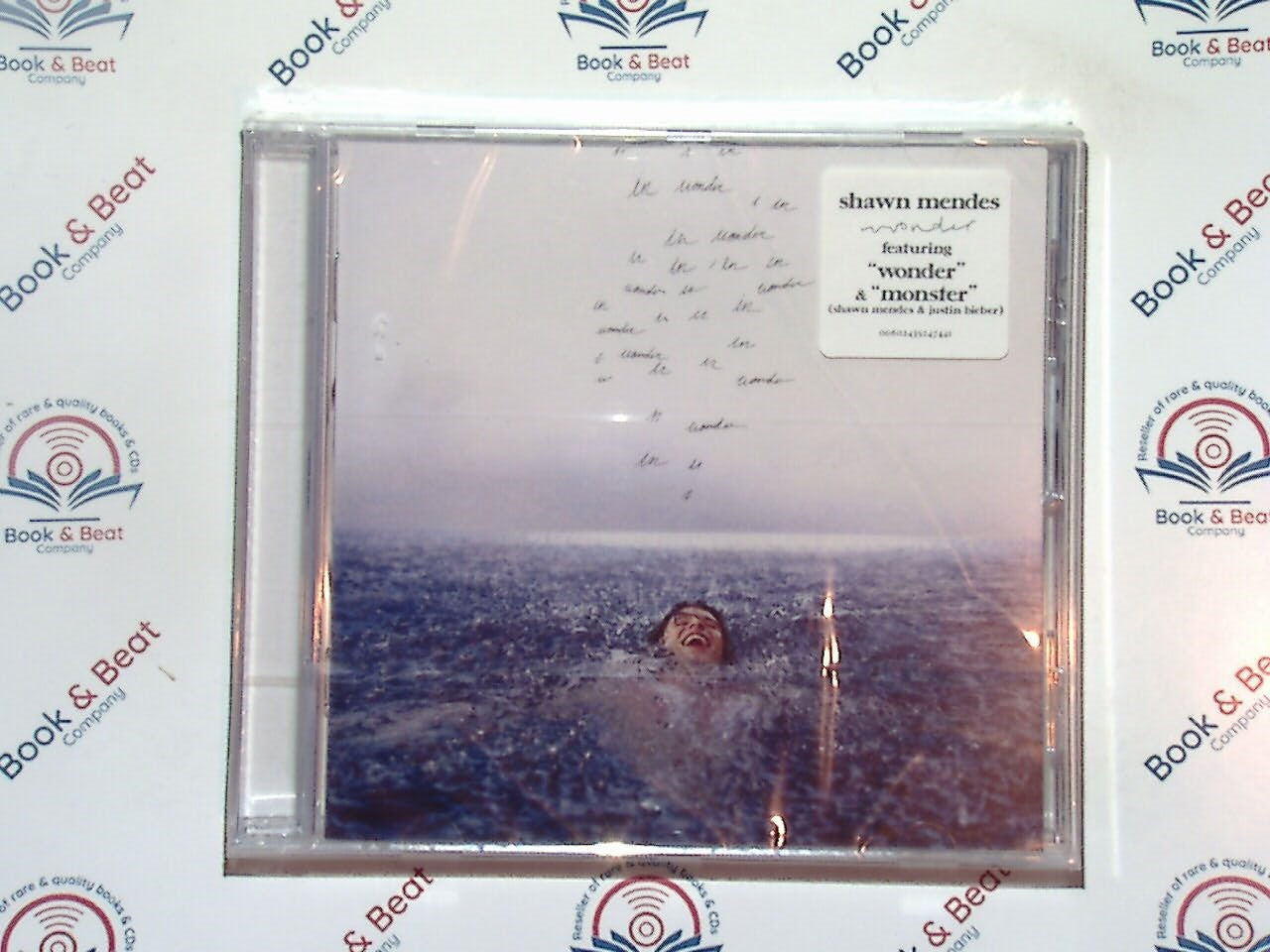 Shawn Mendes, Wonder, pop music, singer-songwriter, contemporary pop, emotional lyrics, chart-topping album, 2020 music, pop rock, hit songs, Canadian artist, acoustic pop, fan favorite, soulful vocals, music collectibles, bookandbeat.com,