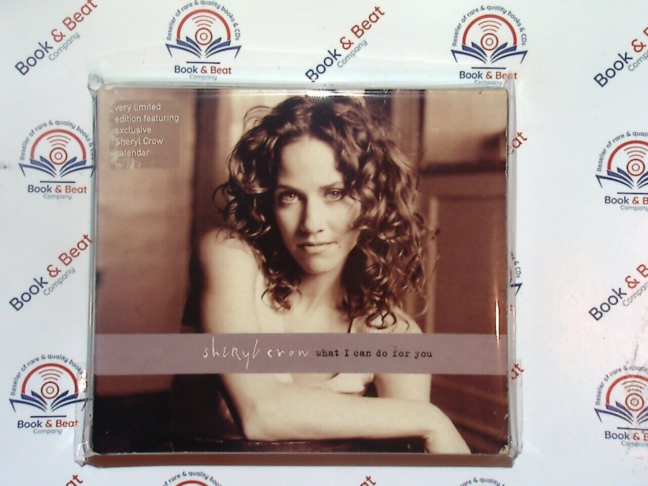 bookandbeat.com, Sheryl Crow, What I Can Do For You, limited edition, rare CD, 1990s music, pop rock, female vocalist, collectible CD, Grammy-winning artist, singer-songwriter, acoustic rock, limited release, alternative rock, exclusive edition, Sheryl Crow fans, rare finds, music memorabilia, iconic artist, 1993 release, debut album tracks.