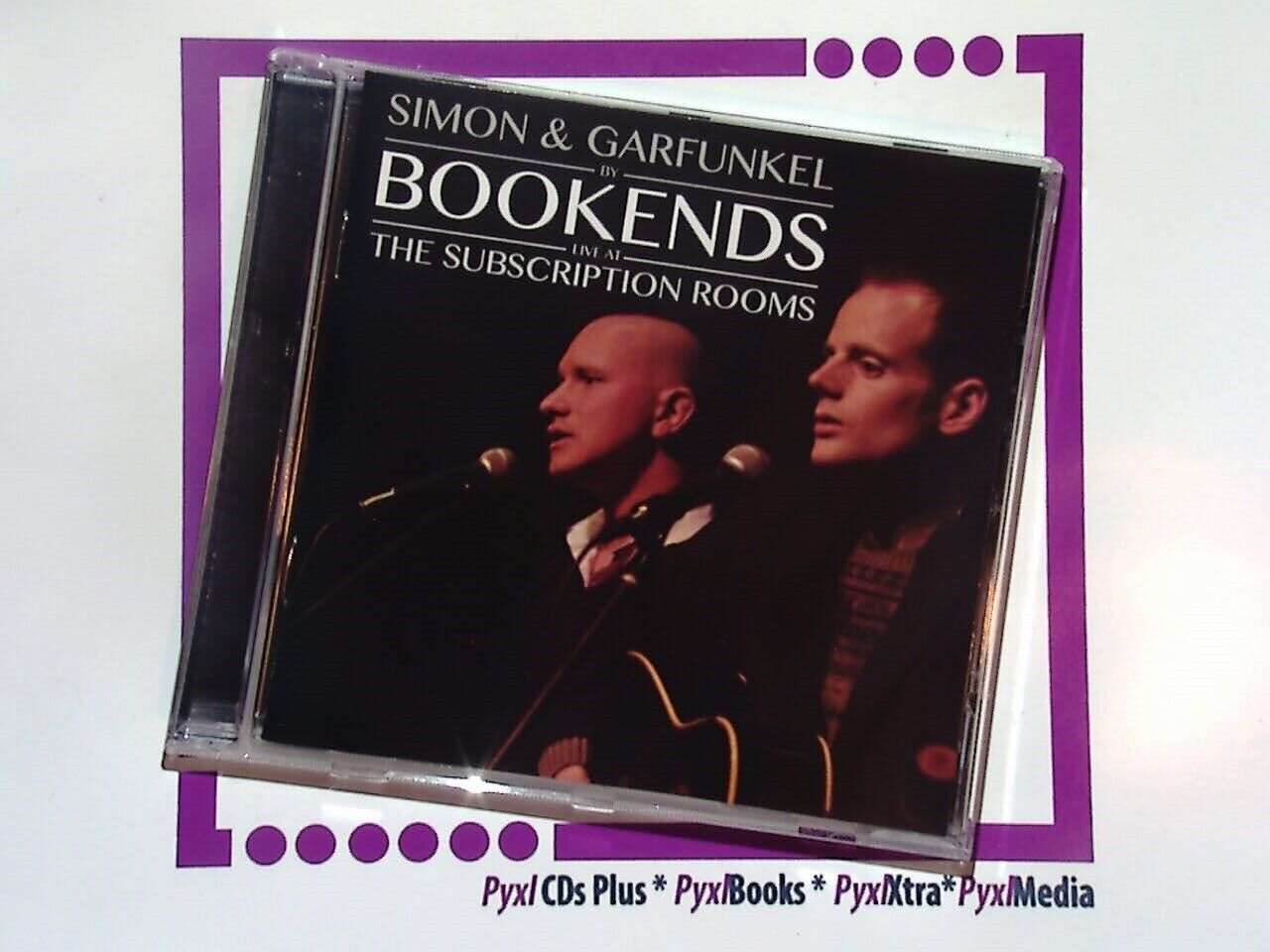 Simon & Garfunkel tribute, By Bookends live album, folk rock, live performance, bookandbeat.com, classic folk, acoustic rock, 60s music, tribute band, timeless hits, Simon & Garfunkel classics, harmonious vocals, acoustic melodies, folk revival, legendary duo, nostalgic music, live recordings, folk favorites, soft rock, live concert,