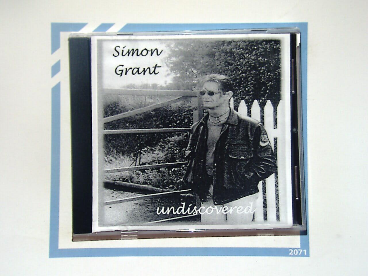 Simon Grant, Undiscovered, Singer-Songwriter, Acoustic Music, Indie Artist, Folk Rock, Alternative Rock, Acoustic Guitar, Melodic Vocals, Heartfelt Lyrics, Independent Music, Emotional Songs, Debut Album, Contemporary Folk, Soft Rock, Soulful Music, Underrated Artist, Authentic Sound, Hidden Gem, Bookandbeat.com,