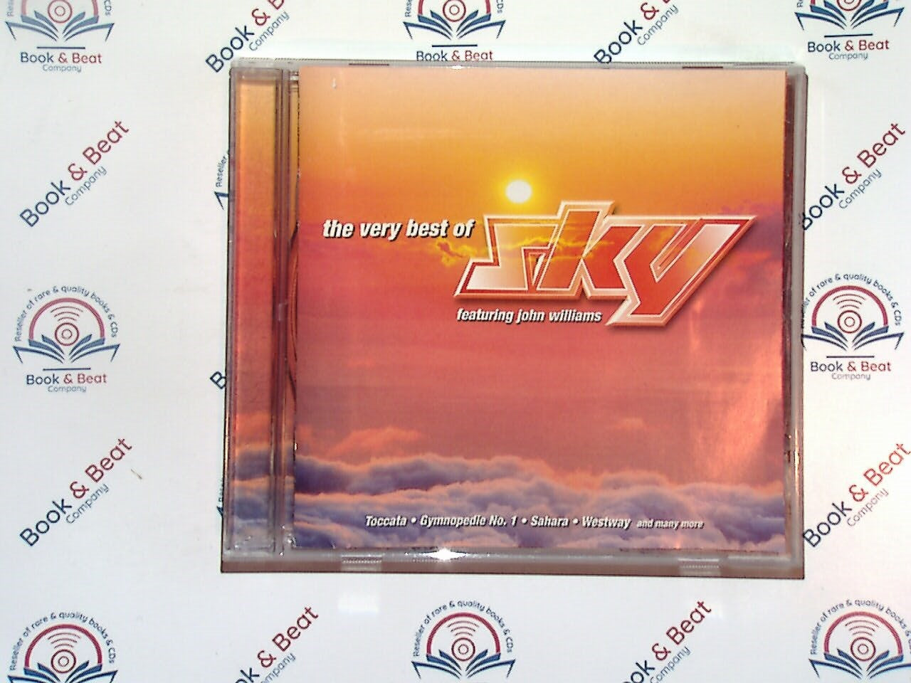 Sky, The Very Best Of, John Williams, classical rock, instrumental classics, fusion music, symphonic rock, orchestral arrangements, progressive rock, iconic guitar, timeless music, greatest hits, legendary performances, Sky band collection, bookandbeat.com,