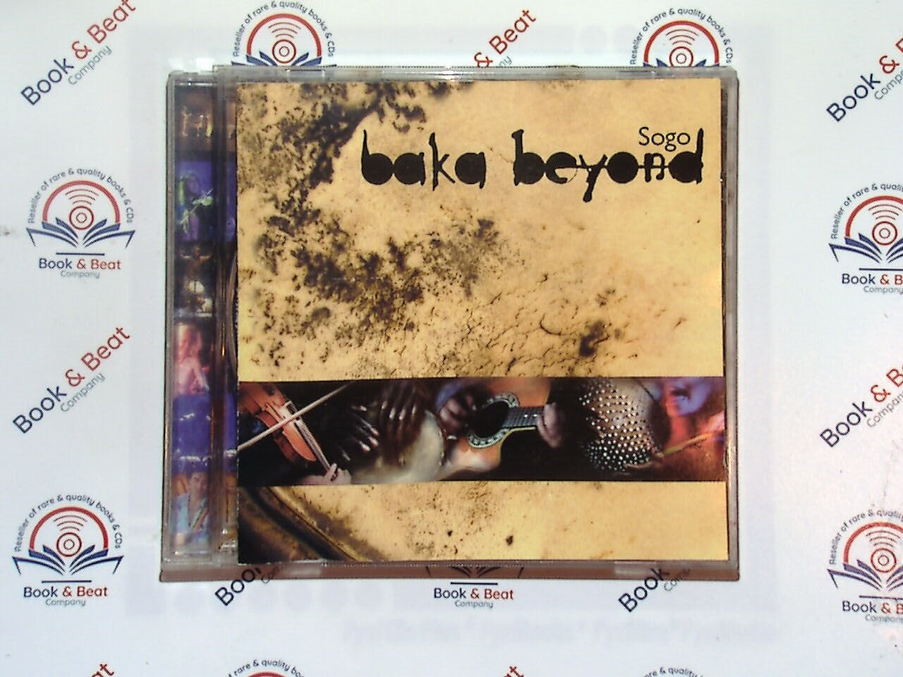 Sogo, Baka Beyond, Afro-Celtic fusion, world music, African rhythms, Celtic melodies, global beats, traditional meets contemporary, multicultural sounds, danceable grooves, tribal influences, folk fusion, unique instrumentation, vibrant percussion, international collaboration, bookandbeat.com,new CDs, used CDs, new books, used books, online music store, online bookstore, rare CDs, rare books, affordable books, affordable CDs, book lovers, music enthusiasts, collectible CDs, vintage books,DVD,