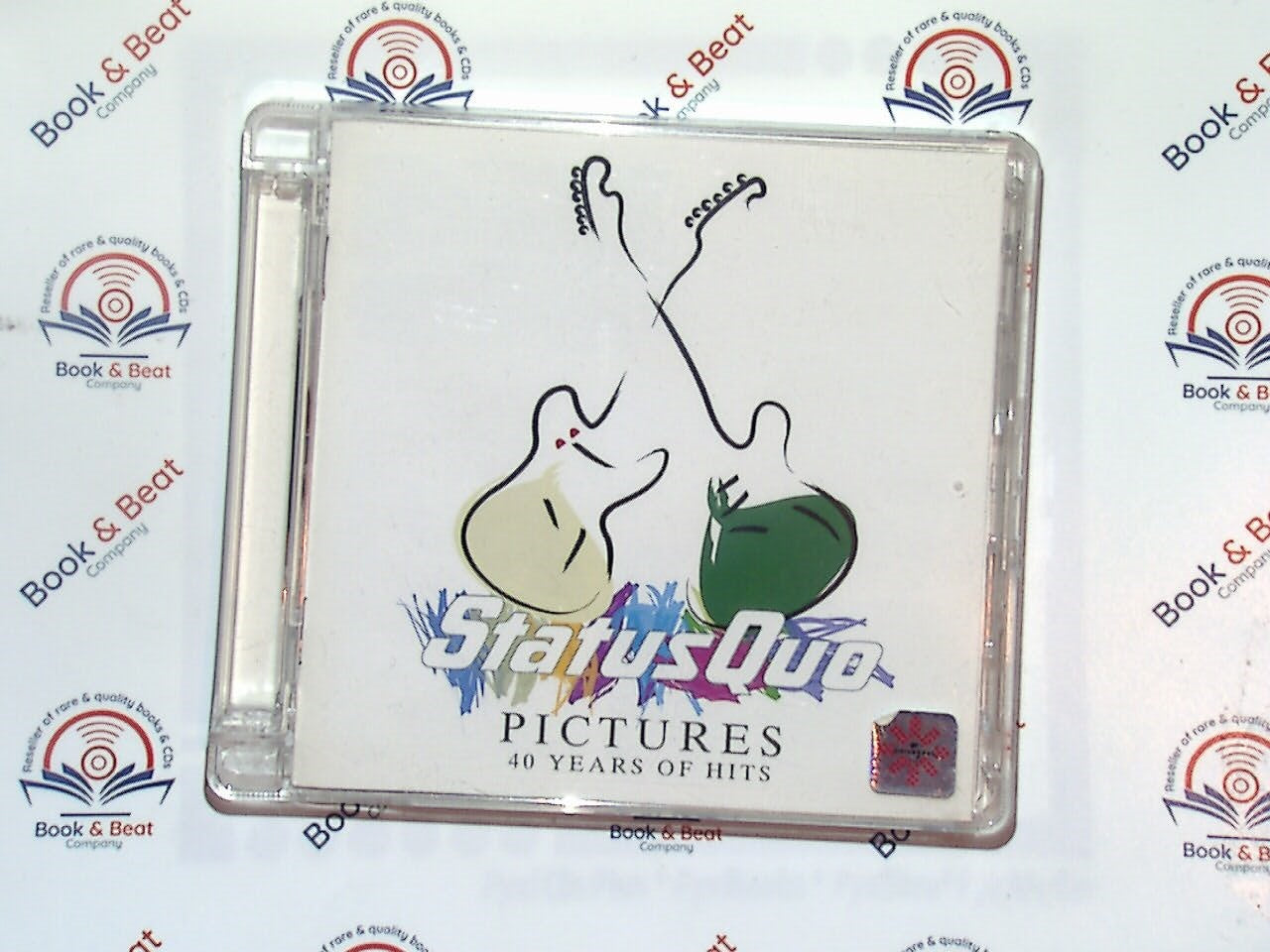 Status Quo, Pictures, 40 Years of Hits, CD, Classic rock, Bookandbeat.com, British band, Greatest hits, Rock anthems, Guitar-driven, 1970s rock, Iconic band, Rock legends, Catchy tunes, Melodic, Timeless classics, Energetic, Hard rock, Classic hits, Rock fans, Music enthusiasts,