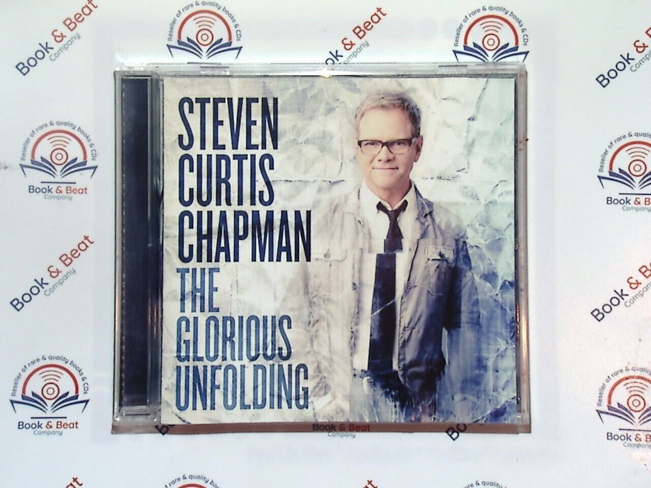 bookandbeat.com, Steven Curtis Chapman, The Glorious Unfolding, Christian album, inspirational music, contemporary Christian, spiritual journey, faith-based, gospel message, life stories, Christian singer-songwriter, uplifting themes, worship, praise music, redemption, hope-filled lyrics, meaningful songs, album of faith, Christian rock, praise and worship, spiritual unfolding, music of hope