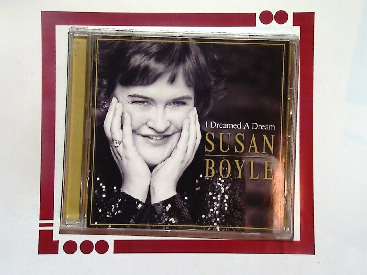 Susan Boyle, I Dreamed a Dream, CD, Bookandbeat.com, Vocal talent, 2009 album, Pop music, Classical crossover, Reality TV star, Britain's Got Talent, Inspirational music, Chart-topping hits, Emotional ballads, Album of the year, Powerful vocals, Contemporary covers, Music awards, UK artist, Best-selling album, Heartfelt performances, Live recordings,