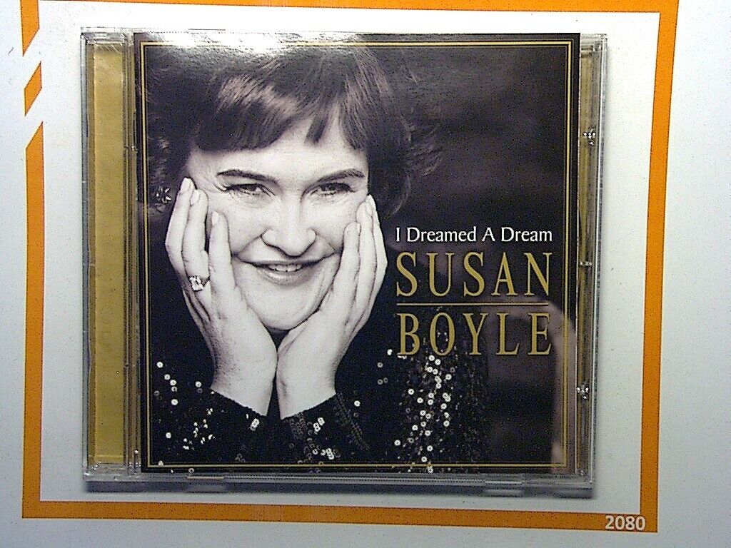 Susan Boyle, I Dreamed a Dream, CD, Bookandbeat.com, Vocal talent, 2009 album, Pop music, Classical crossover, Reality TV star, Britain's Got Talent, Inspirational music, Chart-topping hits, Emotional ballads, Album of the year, Powerful vocals, Contemporary covers, Music awards, UK artist, Best-selling album, Heartfelt performances, Live recordings,