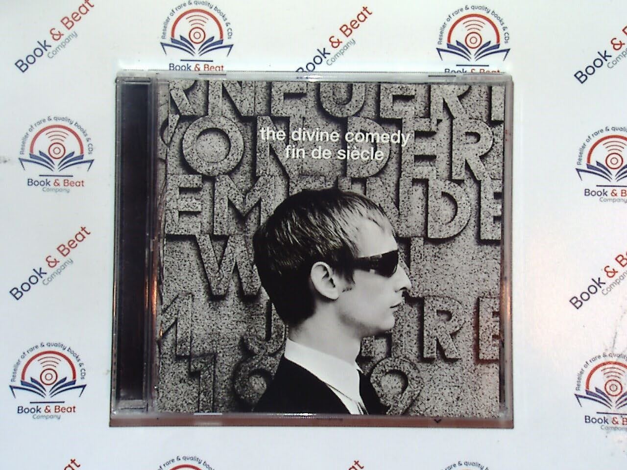 bookandbeat.com, CD, The Divine Comedy, Fin De Siècle, chamber pop, orchestral rock, alternative music, Neil Hannon, Britpop, 90s music, baroque pop, literary lyrics, theatrical style, sophisticated melodies, cult classic, indie rock, new CDs, used CDs, new books, used books, online music store, online bookstore, rare CDs, rare books, affordable books, affordable CDs, book lovers, music enthusiasts, collectible CDs, vintage books,DVD,