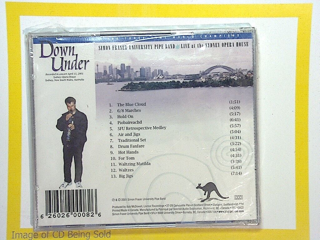 Simon Fraser University Pipe Band, Down Under, Bagpipe Music, Pipe Band, Celtic Music, Scottish Tradition, Highland Music, Traditional Pipes, World Championship Band, Piping Excellence, Live Performances, Drumming, Scottish Heritage, Celtic Sounds, Marching Band, Folk Music, Instrumental Album, Scottish Pipes, Cultural Music, Bookandbeat.com,