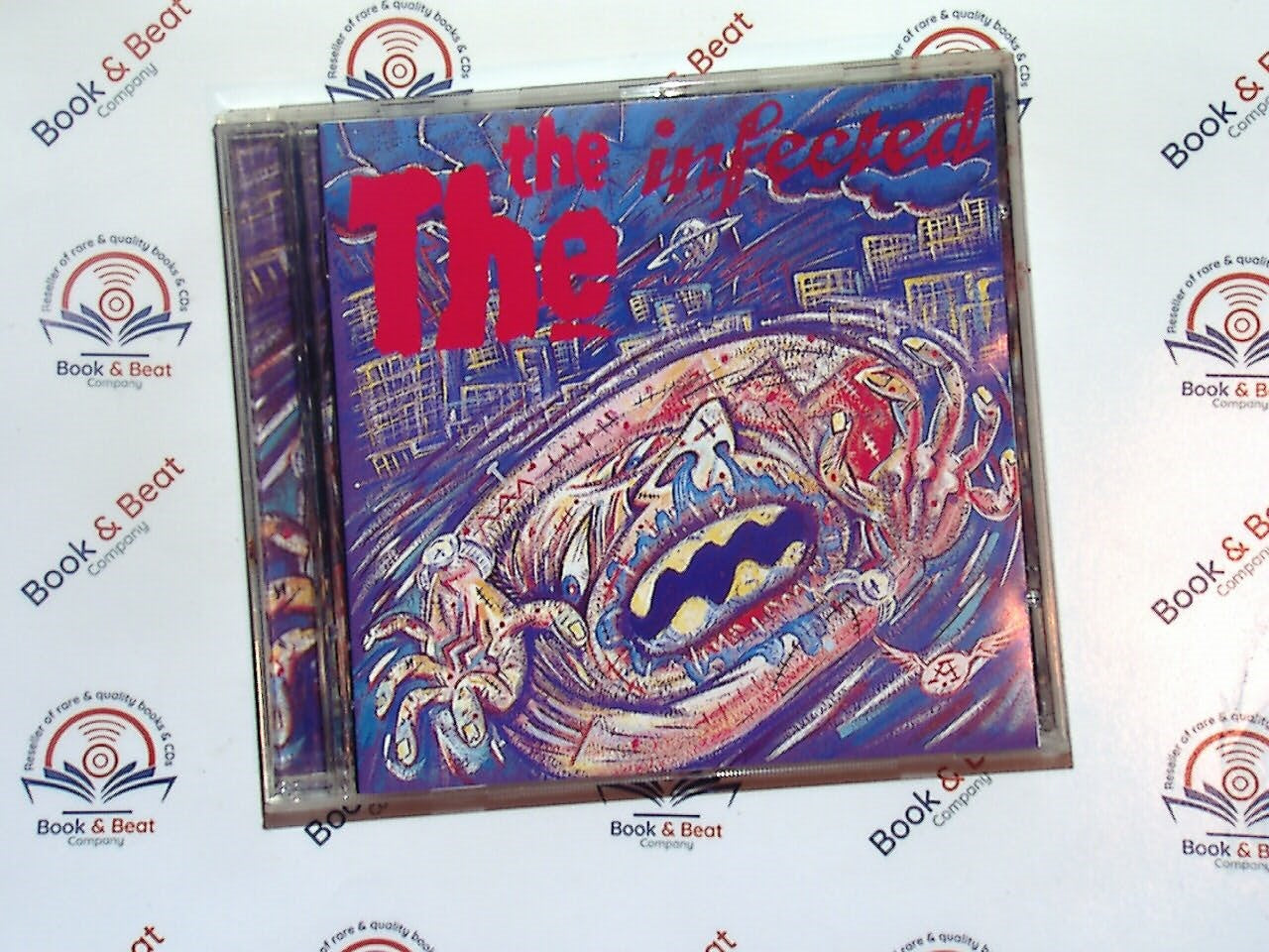 bookandbeat.com, CD, The The, Infected, Remastered Edition, alternative rock, post-punk, new wave, 80s music, synth-driven rock, Matt Johnson, political lyrics, experimental sounds, iconic album, British rock, cult classic, socially conscious music, bookandbeat.com,new CDs, used CDs, new books, used books, online music store, online bookstore, rare CDs, rare books, affordable books, affordable CDs, book lovers, music enthusiasts, collectible CDs, vintage books,DVD,