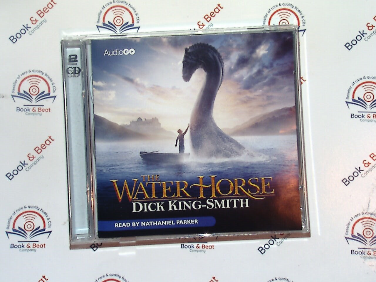 bookandbeat.com, The Water Horse, Dick King-Smith, audiobook, children's literature, fantasy story, mythical creatures, family-friendly, adventure tale, classic children's book, sea monster, Loch Ness, imaginative storytelling, audio format, audiobook for kids, narrated story, bestselling author, young listeners, audio collection, magical tales.