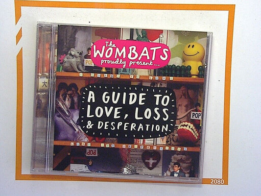 bookandbeat.com, The Wombats, indie rock, alternative, love and loss, debut album, British band, upbeat sound, catchy tunes, emotional lyrics, indie pop, post-punk revival, energetic music, youthful, clever lyrics, pop-punk influence, electric guitar, modern rock, music for youth, bookandbeat.com music.
