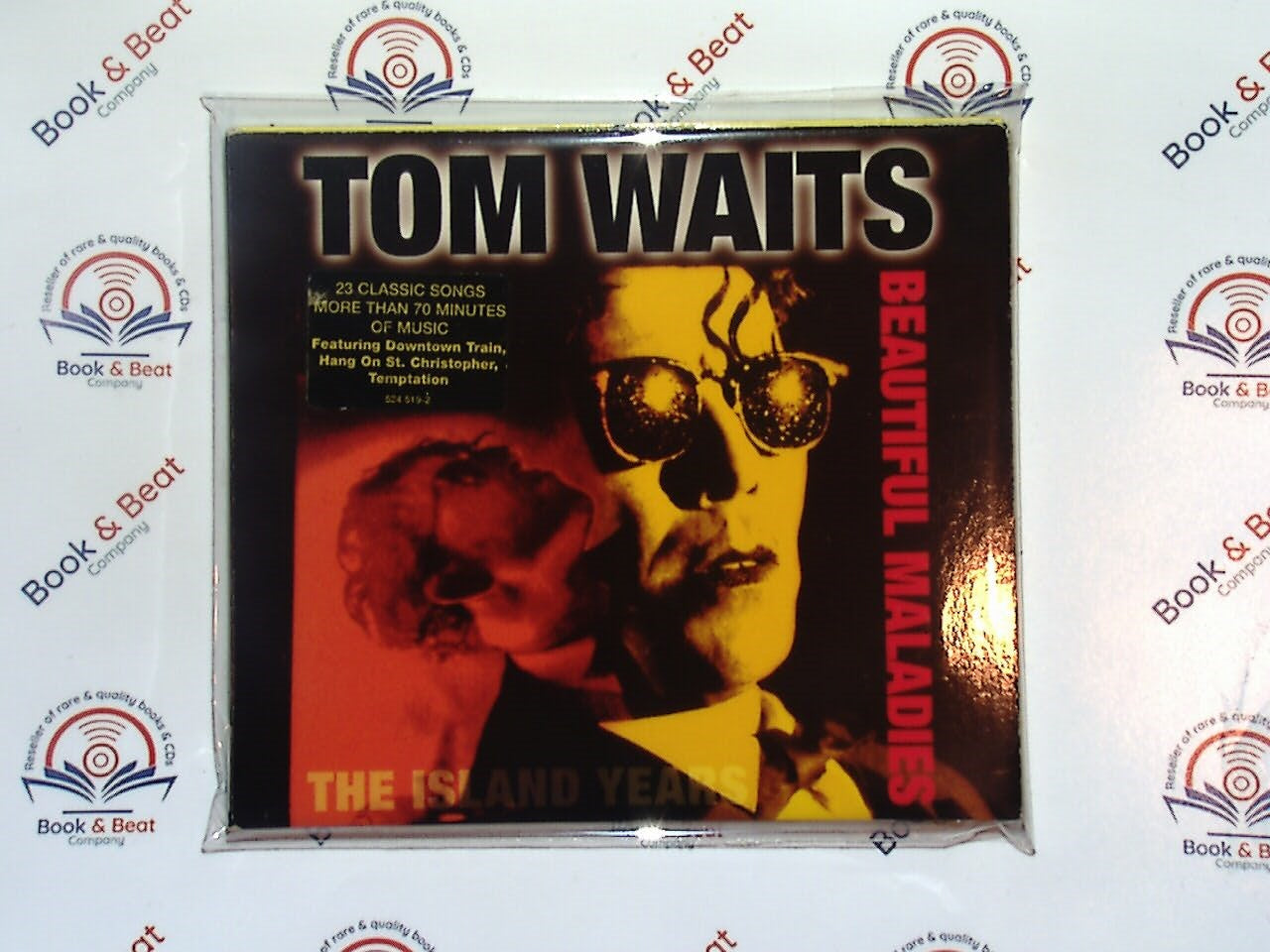 bookandbeat.com, CD, Tom Waits, Beautiful Maladies, alternative rock, blues, jazz influences, singer-songwriter, gravelly vocals, storytelling lyrics, folk rock, experimental music, poetic songwriting, moody atmosphere, iconic artist, compilation album, new CDs, used CDs, new books, used books, online music store, online bookstore, rare CDs, rare books, affordable books, affordable CDs, book lovers, music enthusiasts, collectible CDs, vintage books,DVD,