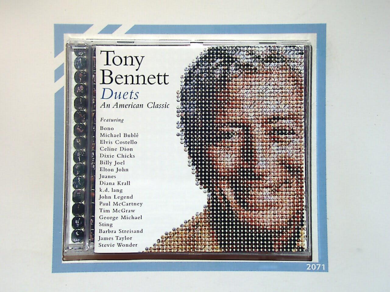 bookandbeat.com, CD, Tony Bennett, Duets: An American Classic, jazz, vocal jazz, classic pop, legendary singer, American songbook, timeless duets, Frank Sinatra style, Grammy-winning album, smooth vocals, big band sound, star-studded collaborations, sophisticated music, new CDs, used CDs, new books, used books, online music store, online bookstore, rare CDs, rare books, affordable books, affordable CDs, book lovers, music enthusiasts, collectible CDs, vintage books,DVD,